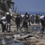 Plus de 1000 personnes qui cherchaient à obtenir de l'aide humanitaire, ont été tuées à Gaza, selon le HCR. KEYSTONE/AP/Jehad Alshrafi